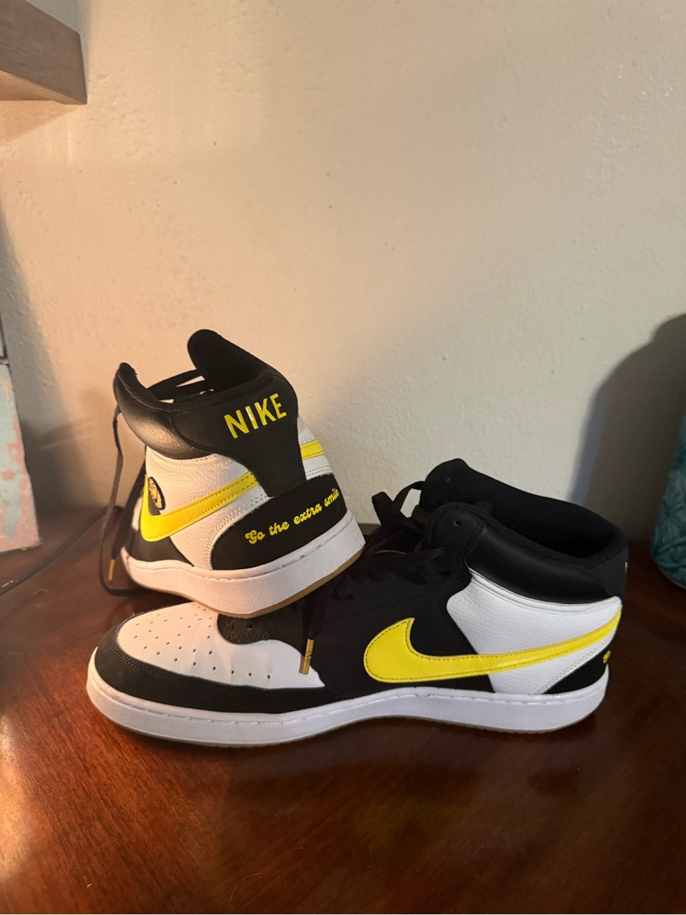 Nike men’s High-Top Sneakers in Black, White & Yellow Swoosh
